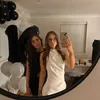 AT