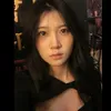 T.