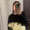 M.