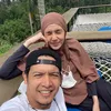 Dhini Aminarti