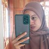 ammi_tita