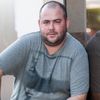לירן חולצה אפורה