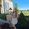 ella_comer