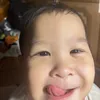 bé mèo mũm mỉm
