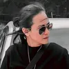 S.