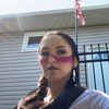red.plume.woman