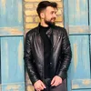 akam_j_shex77
