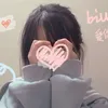 L.