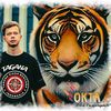 O K T A √