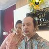 Larry Holmes Sinaga