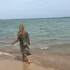 М.