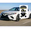 SD-N driving a Toyota Camry