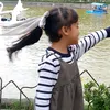 K.