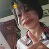 T.