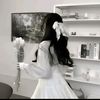 delia_sinting