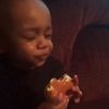 Sad Kid eating burger