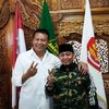 K. H UJANG BUSTOMI