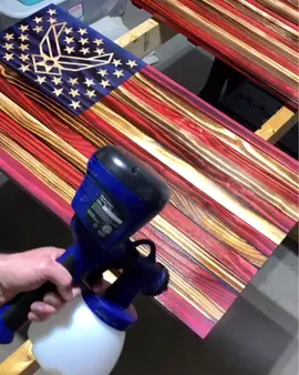 Laying down clear coat on an Air Force flag. #airforce #clearcoatisgone #woodflag #oddilysatisfying #spraychallenge