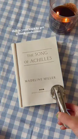 one of the best gifts I’ve ever received from @carcaryayayee is this book embosser 🤍 #bookembosser #bookstamp #songofachilles #madelinemiller