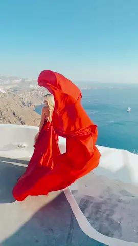 Floating on this magical island in Greece 🇬🇷🧿💙💃🏼. #flyingdress #santorinigreece #greecetravel #greeksummer2021 #beautifultravel
