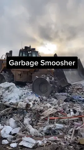 A garbage smoosher making a few passes at a landfill dedicated to construction and building debris. It’s all about compaction.