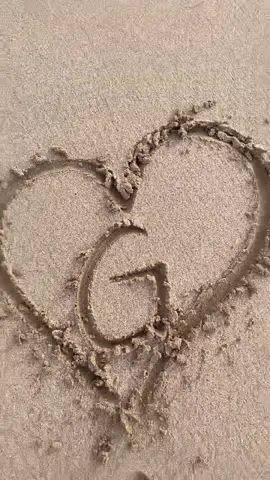 Reply to @lifeislikeastory G <3 #G #initials #snowheart #EveryKiss #foryou #fyp #foryoupage #beach #beachheart