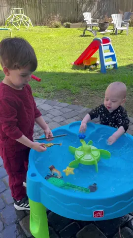 Big brother is a good sport about getting splashed 😂 #babiesoftiktok #babytok #babyfever #brothers #bffs #brotherlove #playoutside #watertable #sensoryplay #playideas