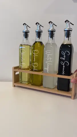 A closer look at our Oil and Vinegar Dispensers with two different bamboo racks. Which rack is your favorite? Comment 1 for the first and 2 for the second rack style. .......#ourhappyhome #ourhappyhomedesigns #storagesolutions #oildispensers #pantry #kitchenorganization #kitchenaccessories #kitchenstorage #organizing #pantrygoals #kitchenmakeover #homeorganizing #organizedhome #storageideas #homeorganization #dreamkitchen #kitchenessentials #stayorganized #storagegoals #gettingorgan