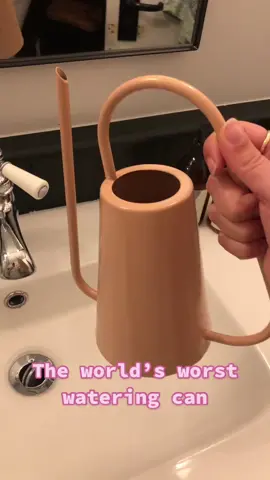 The world’s stupidest watering can 😂😭 What is this for?! #homesense #watering #stupiditems #crapproduct #baddesign #designfail