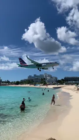 American Airlines from Miami landing at St. Maarten's Princess Juliana International Airport (SXM). 🇺🇸✈️🇸🇽🏖 It's a busy runway, notorious for its proximity to Maho Beach and the scenery the low approaching aircraft offer to crowds on the sand. #mahobeach #sxm #stmaarten #sintmaarten #caribbean #stmartin #saintmartin #sxmstrong #maho #stmarteen #sxmairport #aviation #saintmaarten #sxmlife #airplane #princessjulianaairport #planespotting #mahobeachstmaarten #avgeek #avgeeks #avgeeksassemble