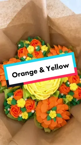 Such a pretty bouquet #cupcake #cupcakebouquet #buttericing #flowers #cakeart #icing #pipingskills #orangeflower #yellowflower #flowercake #yummy