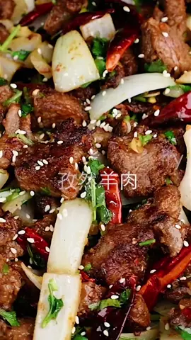 Real-deal Xinjiang cumin lamb recipe that yields crispy juicy lamb pieces coated with a bold cumin chili spice mix, stir fried with onion, garlic and cilantro. It’s a dish you can easily make at home, and it tastes just like what you’d get in China.Click the link on my profile page and search “cumin lamb” to view the recipe. #chinesefood #foodtiktok #easyrecipe