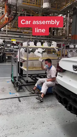 Bro building cars on a stool