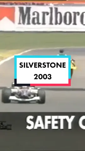 Irish Armageddon Priest Neil Horan at the 2003 British GP with signs saying 