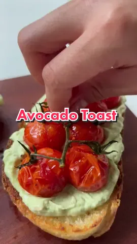 Baked cherry tomatoes idea credit goes to @_lacebakes_ . Avocado and cream cheese and baked cherry tomatoes. So tasty 🤤 #fyp #viraltiktok #viralvideo #avocadotoast #avocado #cherrytomato #Recipe #breakfastideas #breakfast