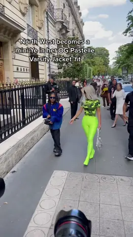 Kim Kardashian may think she was exuding main character energy with her highlighter Balenci look, including the favored Le Cagole bag and pantashoe trousers, but it was North's 'fit that proved to be the moment. North stepped on the scene wearing the iconic Pastelle varsity jacket from Kanye's forgotten fashion line. 🎥: @thibaut #style #highsnobiety #northwest