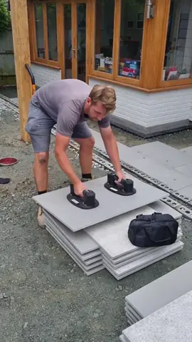 Getting the patio down with double Grabo’s  💪#tradectory #paving #patiodesign #patiodesign #paver #landscaper #grabo #powertools #tools #tiler #contractor