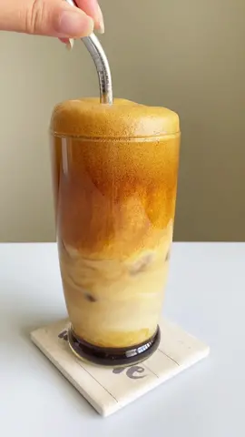 Iced Whipped Coffee is made with just 3-ingredients! Who needs fancy stuff when you have this delicious creamy cup of coffee. #anaandzel #whippedicedcoffee #whippedcoffeetutorial #whippedcoffeecheck #whippedicecoffee