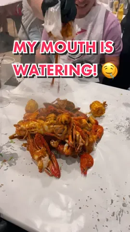 Steaming hot seafood boil poured out right in front of you! 😍🤤 #kickininn #seafood #funny #australia #pov #reveal #sodelicious #lights #Soccer #multiverse