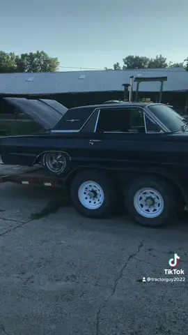Unloading the 1966 lowrider thunderbird. Non running.
