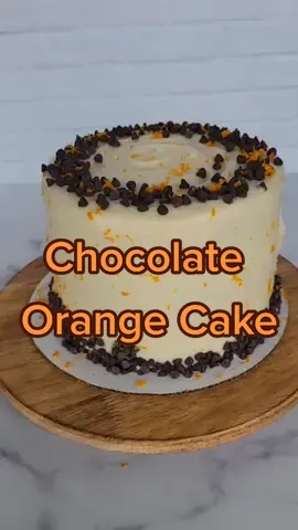 Chocolate Orange Cake 🍫🍊 If you haven't tasted chocolate and orange together you're seriously missing out. This cake is extra moist and covered in a luscious Orange Cream Cheese Frosting! #chocolateorange #cakesoftiktok #orangecreamcheesefrosting #chocolateorangecake #cakerecipe #cakedecorating #cake #baking #bakingszn