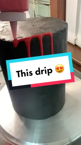 Red drip! I often get asked why the drips don’t go to the bottom. Two things - The secret is a cold cake. The coolness of the cake will stop the drip in its tracks and second, is a light pressure when squeezing the chocolate out, only a little is needed #dripcake #blackcake #cakestuff #debbiebakes #cakehowto #watchme #buttercream #cakedecorating #cakehelp #chocolatedrip #blackbuttercream #reddripcake #cake 