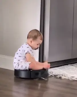 Baby sitting on vacuum cleaner robot 🤖😂 #firsttimemom #babymama #mom #activity #Pome #trending #vacuum #cleaner #robot #funny 