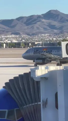 Raider plane cruising through Las Vegas #allegiant #airplane #harryreidairport 