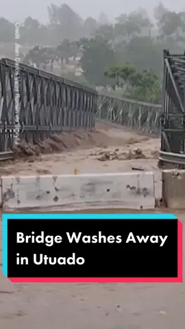 On Sept 18th in Utuado, Puerto Rico. A bridge can been seen being washed away by surging floodwaters due to Hurricane Fiona. Video filmed by Utuado resident Jean Carlos Velez Roman shows the metal bridge buckling under the pressure of the rover and floating away.  The temporary bridge was installed after the previous bridge was swept away during Hurricane Maria back in 2017.  For more, go to CP24.com #cp24 #hurricane #hurricanfiona #purtirico 