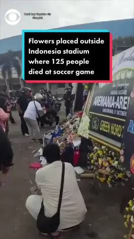 Flowers were placed outside the stadium in Indonesia where 125 people were killed in a stampede of fans at a soccer match. #news #indonesia #Soccer
