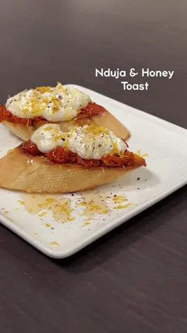 ‘Nduja want some of them!  ‘Nduja, whipped ricotta and honey toast. Super easy and class for a few nibbles with some vino🍷 💥  Ingredients: Tub of ricotta 2 Tbsp white balsamic 1 Tbsp olive oil  Salt and pepper to taste  ‘Nduja Honey Lemon zest Baguette  Method: Whip ricotta, balsamic, oil and salt + pepper in a bowl.  Toast your baguette slices.  Spread ‘nduja on the bottom on the toasted bread.  Follow with the ricotta, salt/pepper, lemon zest and honey.  And enjoy!!!