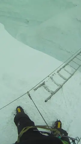 Walking over the ladders in Khumbu Icefall on Mount Everest #MountEverest #Nepal #Icefall #Ladders