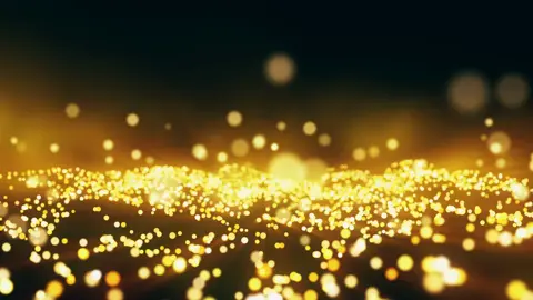 • Fundo Abstract Movimento Festivo com Loop sem Costura de Partículas de Ouro a Brilhar | 4K