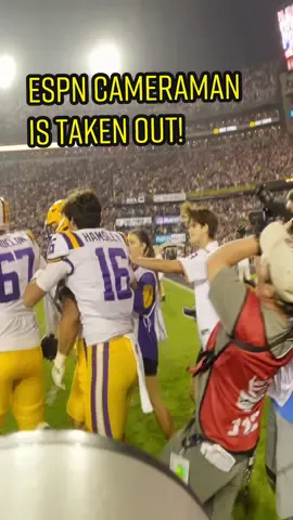 Replying to @edits_sports22 LSU vs Bama storms field and espn camera man gets taken out. #lsu #lsufootball #espn #cameraman 